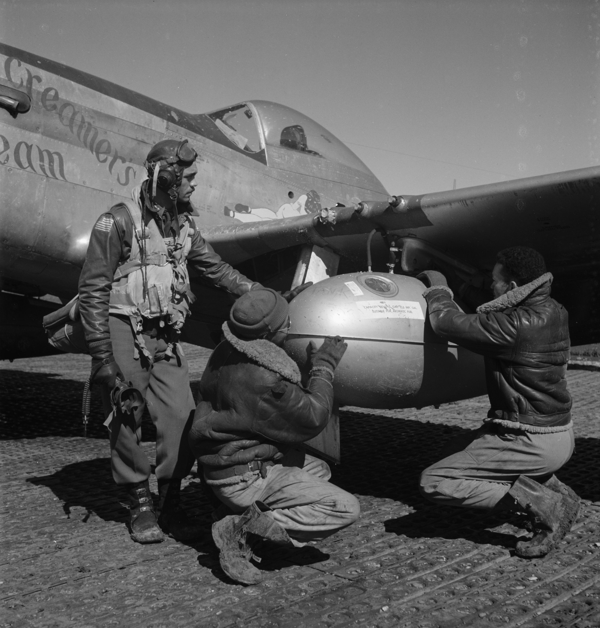 Edward C. Gleed and two unidentified Tuskegee airmen, Ramitelli, Italy, March 1945.